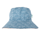 Blue bucket hat with white dinosaur pattern on a white background