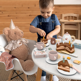 Child playing with the SPEEDY MONKEY Birthday Tea Set