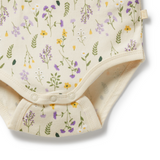 Detailed view of snap closure on WILSON & FRENCHY Bella Floral Organic Bodysuit