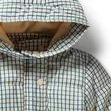 Detail view of hood and button front