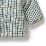 Detail view of pocket, sleeve and button front