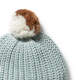 Detail view of pompom and knit of WILSON & FRENCHY Duck Egg Organic Knitted Hat