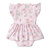 Back view of Baby romper with floral and tea cup pattern on a white background