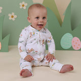 Baby sitting on ground wearing SNUGGLE HUNNY Easter Bunnies Organic Snugglesuit Convertible Romper