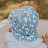 Back view of baby wearing BEDHEAD HATS Legionnaire Flap Sun Hat - Dalmation