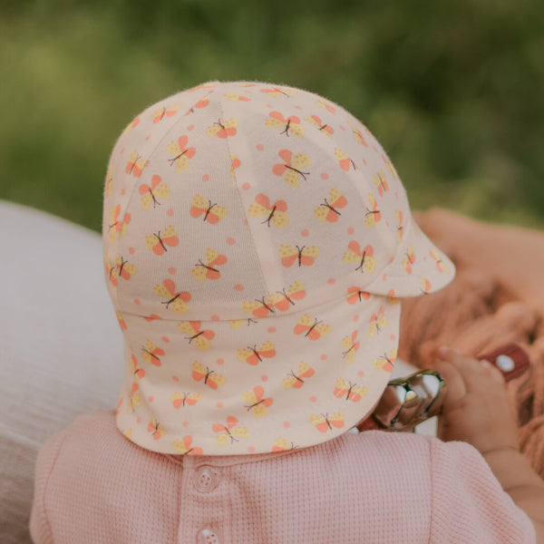 Back view of child wearing BEDHEAD HATS Legionnaire Flap Sun Hat - Butterfly