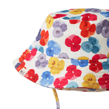 Detail view of Colourful floral-patterned bucket hat on a white background