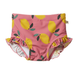 Pink children's swim bottoms with lemon pattern on a white background