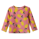 Pink long-sleeve rash shirt with yellow lemon pattern on a white background