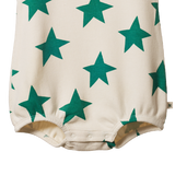 Baby romper with green star pattern on a white background