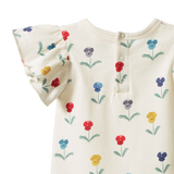 Back view of Baby onesie with floral patterns on a white background showing snap neck closures and frill sleeve
