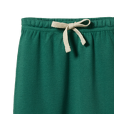 Green pants with a beige drawstring on a white background