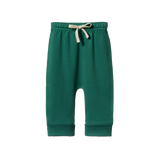 Green baby pants with a beige drawstring on a white background