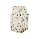 Baby romper with sailboat pattern on a white background