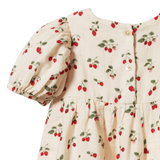 Back view of Children's dress with strawberry pattern on a white background