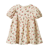 Beige dress with strawberry pattern on a white background