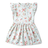Floral and tea-themed dress on a white background