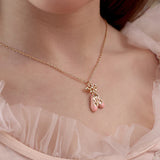 Child wearing the LAUREN HINKLEY Ballet Slippers Necklace