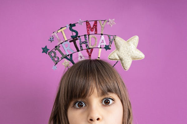 Child wearing the MIMI & LULA Birthday Headdress - Hooray