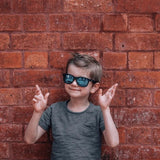 Child wearing BABIATORS BLUE SERIES - NAVIGATOR - POLARISED BABIATORS The Scout