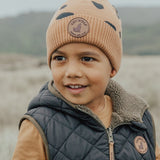 Child wearing the CRYWOLF Pom Pom Beanie - Stones detail view