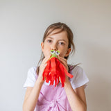 child playing with a creation from the TIGER TRIBE Mindfully Me - Breathe. Relax. Create.