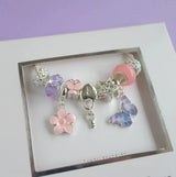 LAUREN HINKLEY Purple Butterfly Magic Charm Bracelet boxed