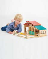 Child playing with the TENDER LEAF Farm
