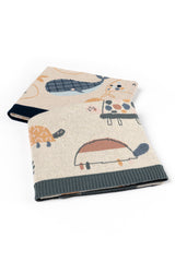 INDUS DESIGN Tilly Turtle Baby Blanket and Wilbur Whale Baby Blanket folded