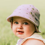 Baby wearing the BEDHEAD HATS Legionnaire Flap Sun Hat - Koala