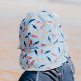 Baby wearing the BEDHEAD HATS Kids Swim Legionnaire Beach Hat - Surfboard back view