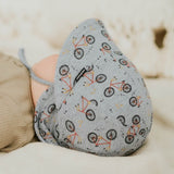 Baby lying down wearing the BEDHEAD HATS Legionnaire Flap Sun Hat - Treadly