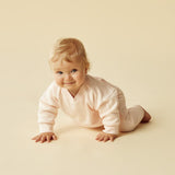 Baby crawling wearing WILSON + FRENCHY Pink Organic Quilted Sweat