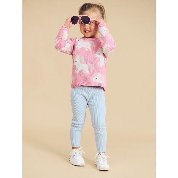 Girl wearing HUXBABY Unicorn Knit Jumper Bubblegum and Ice Water rib leggings