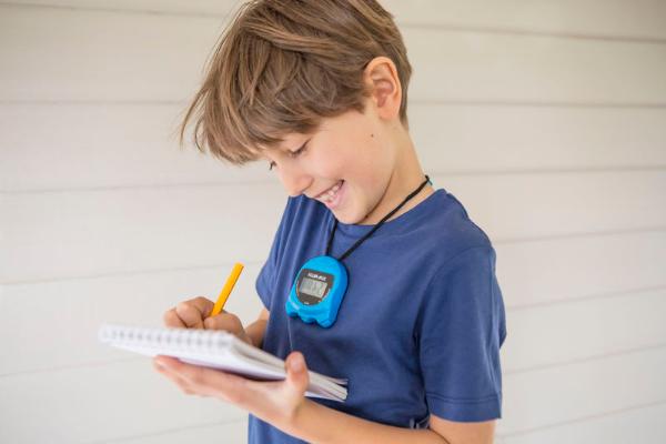 Boy doing a Beat the Clock activity