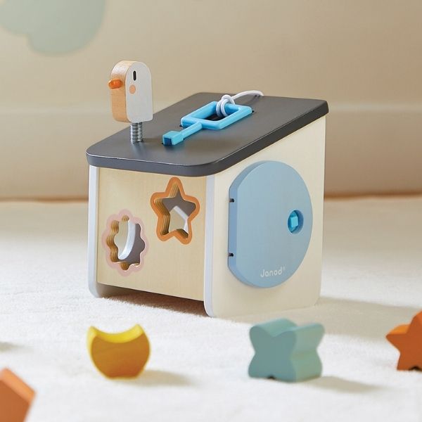 JANOD COCOON Bird House Shape Sorter on the floor