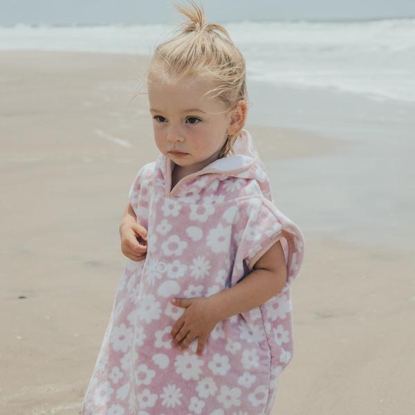 Toddler at beach wearing CRYWOLF Baby Hooded Towel - Blush Floral