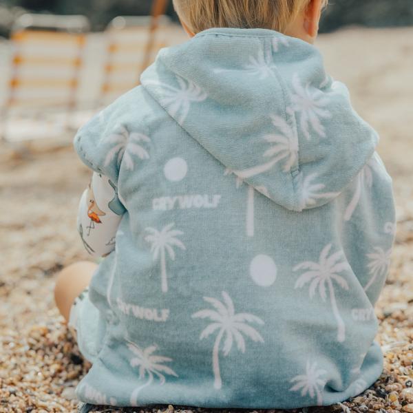 Back view of toddler wearing CRYWOLF Baby Hooded Towel - Pacific Blue