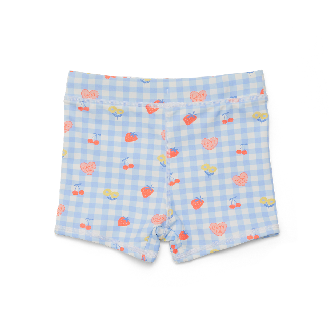 Back view of blue Checkered swim shorts with heart and cherry pattern on a white background