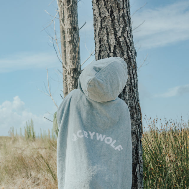 Back view of logo on the CRYWOLF Everywhere Zip-Up Towel - Ocean Colour Block