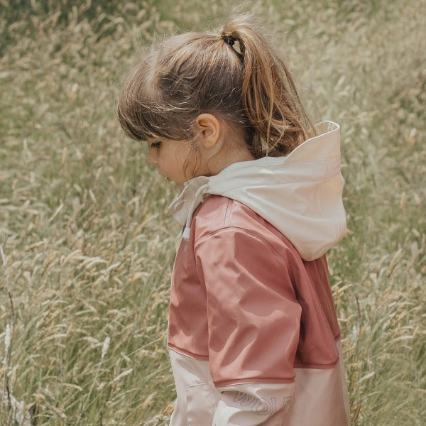 Side view of child wearing CRYWOLF Explorer Jacket Blush Rosewood