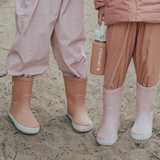 Kids wearing CRYWOLF Rain Boots Dusty Pink and Terracotta