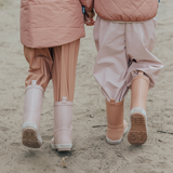 Back view of kids wearing CRYWOLF Rain Boots Terracotta and Dusty Pink