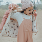 Child wearing CRYWOLF Rain Overalls Terracotta