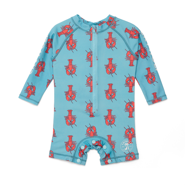 Blue baby swimsuit with red lobster pattern on a white background