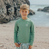 Boy wearing CRYWOLF Rash Vest - Coastal Green