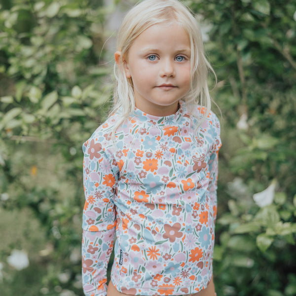 Girl wearing CRYWOLF Rash Vest - Flower Market