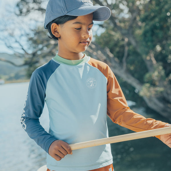 Boy wearing CRYWOLF Rash Vest - Ocean Colour Block