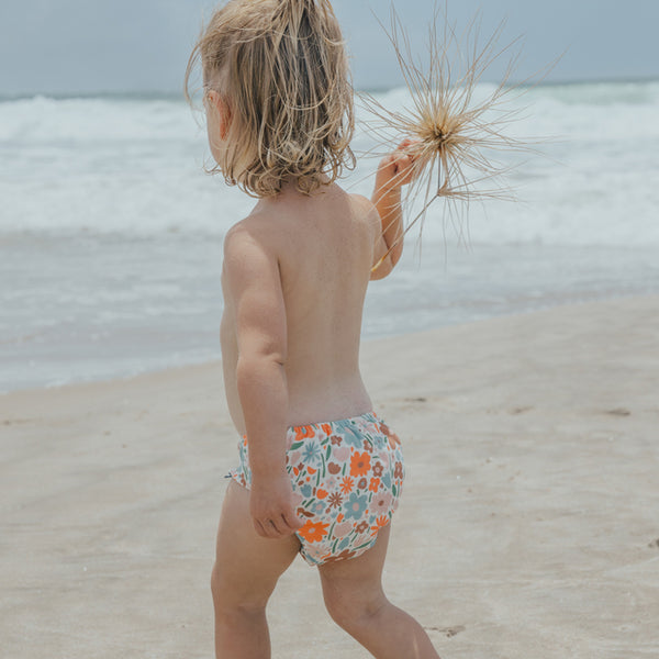 Back view of child wearing CRYWOLF Reusable Swim Nappy - Flower Market