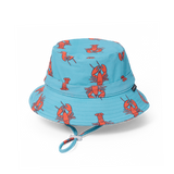 Blue bucket hat with red lobster pattern on a white background